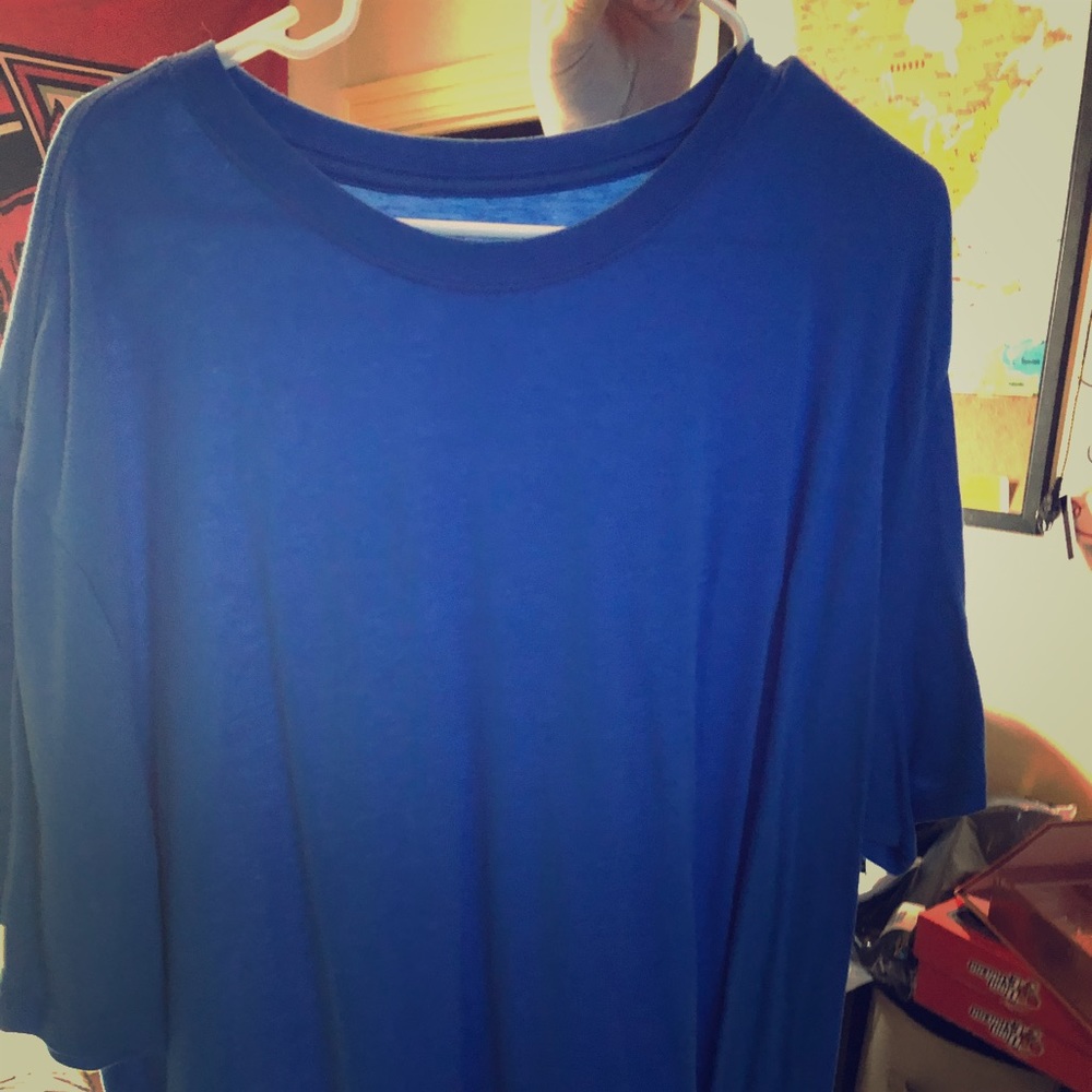 3 George tee shirts. 1 blue. 1 gray. 1 white.